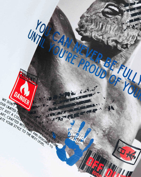 Forth photo is a Close-up of the 'Embracing Your Presence' white relaxed t-shirt from Off Dutty, focusing on the intricate details of the quote and design elements, highlighting the artistry of the tee.