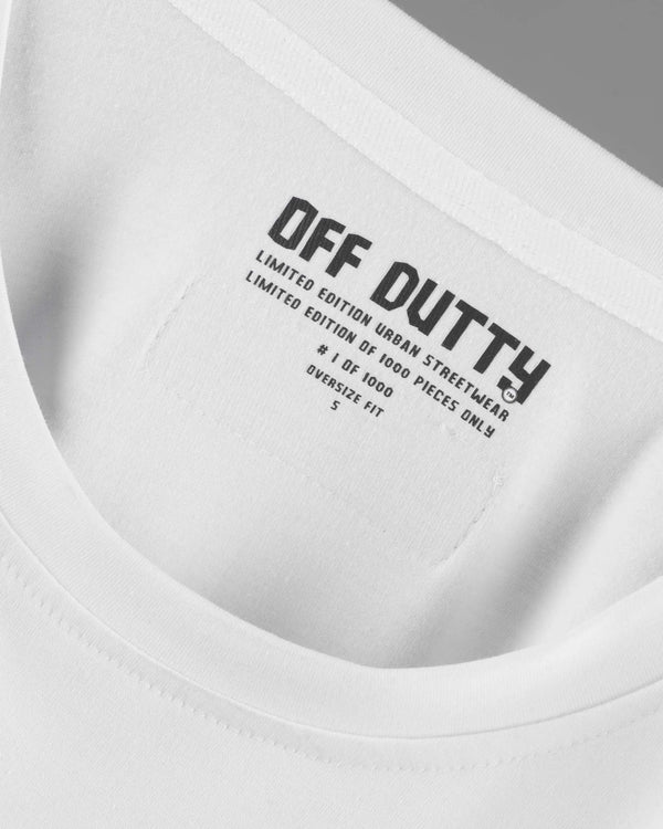 Close-up of the inside label of Off Dutty's 'What Is Happiness' white relaxed t-shirt, showcasing the printed Off Dutty logo and 'Limited Edition Urban Streetwear' text. The label also highlights the t-shirt's unique number in the limited series of 1000, its 'Relaxed Fit' designation, and the size of the garment.